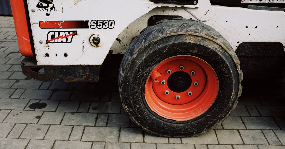 What are those small red triangles on the mini map? [duplicate] - Small dirty red wheel of mini truck parked on pavement on street near modern warehouse