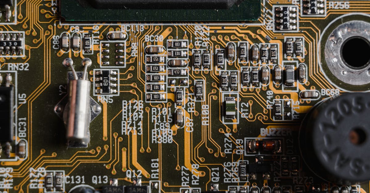 What Atari system does this 1980s PCB go to? - Yellow and Black Computer Motherboard What Atari system does this 1980s PCB go to? - Yellow and Black Computer Motherboard
