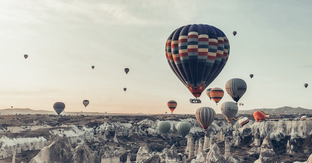 What blocks can Experience Orbs travel through? - Multicolored hot air balloons flying above famous vast rocky valley in Cappadocia Turkey on early morning on fair weather What blocks can Experience Orbs travel through? - Multicolored hot air balloons flying above famous vast rocky valley in Cappadocia Turkey on early morning on fair weather