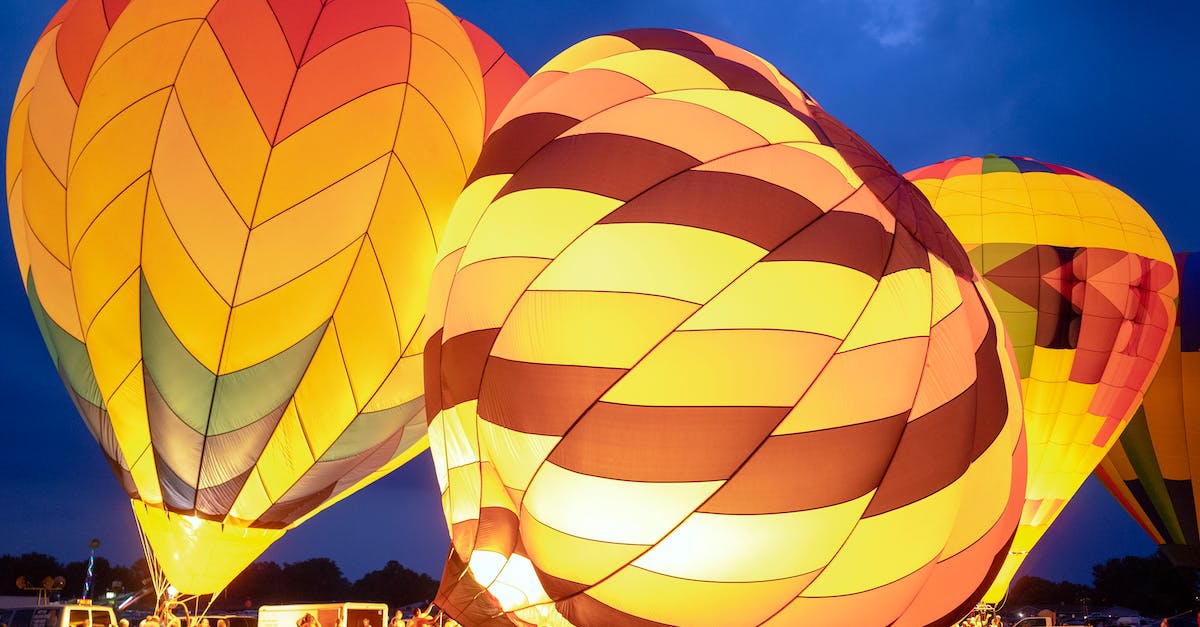 What blocks can Experience Orbs travel through? - Group of people preparing bright air balloons to fly What blocks can Experience Orbs travel through? - Group of people preparing bright air balloons to fly