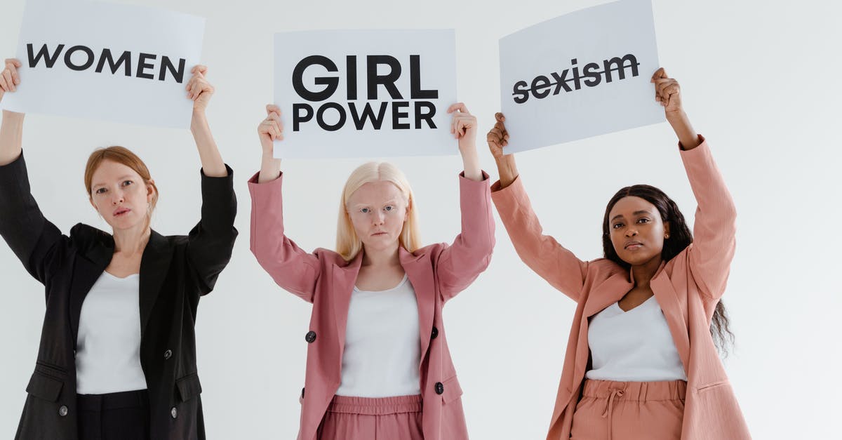 What cards are rarer than epic? - Photograph of Women Holding White Cards