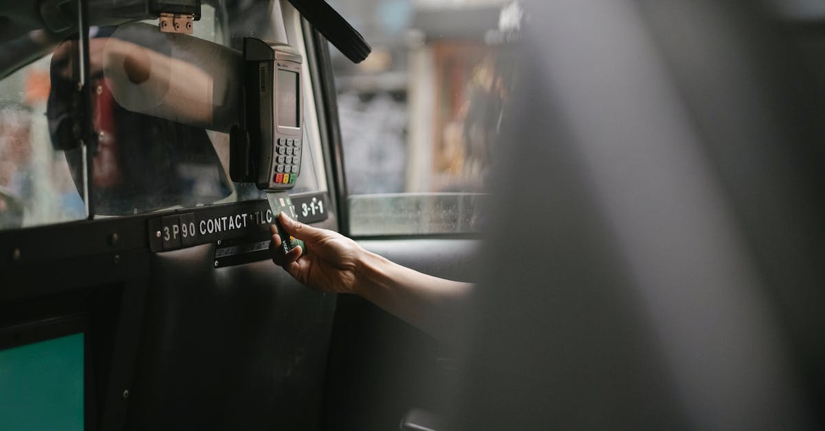 What cards, if any, should I use for unimportant battles? - Passenger using credit card for paying taxi ride