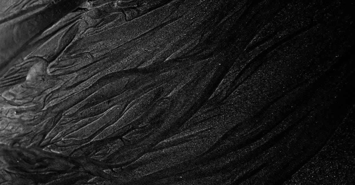 What causes mineral classification downgrade? - Rough dark sand of shallow river What causes mineral classification downgrade? - Rough dark sand of shallow river