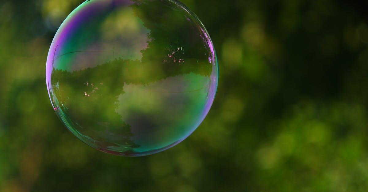 What colour is the ball? - Focus Photography of a Bubble