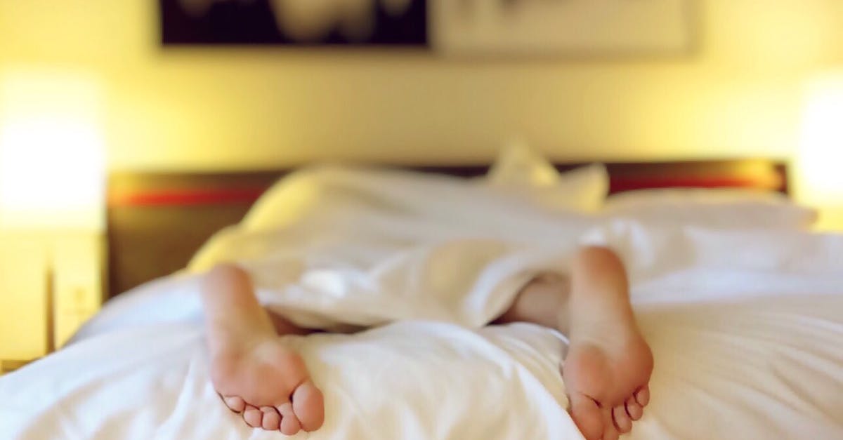 What command can let a player sleep in the morning? - Person Lying on Bed Covering White Blanket