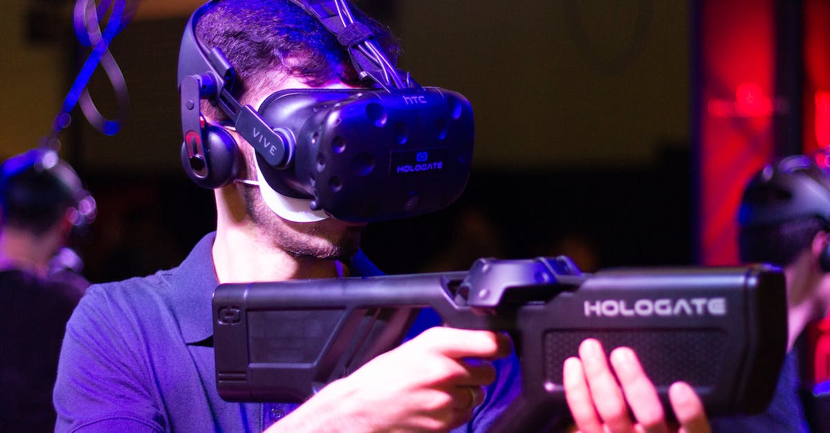 What control options are there for Wii U Virtual Console games? - Man in VR with game riffle playing video game What control options are there for Wii U Virtual Console games? - Man in VR with game riffle playing video game