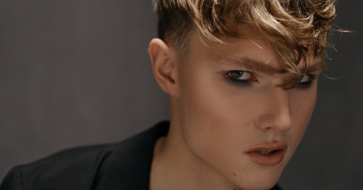 What counts for longest headshot? - Woman in Black Blazer Looking Down