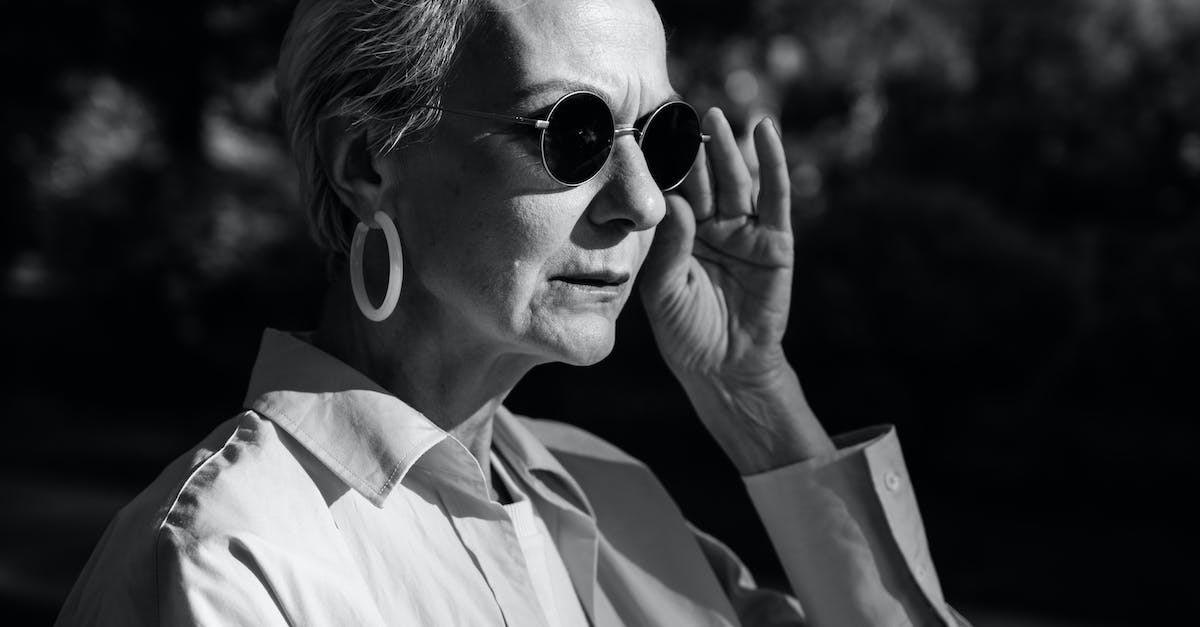 What counts for longest headshot? - Grayscale Photo of Woman Wearing Sunglasses