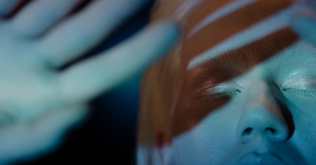 What counts for longest headshot? - Woman With White and Brown Face Paint