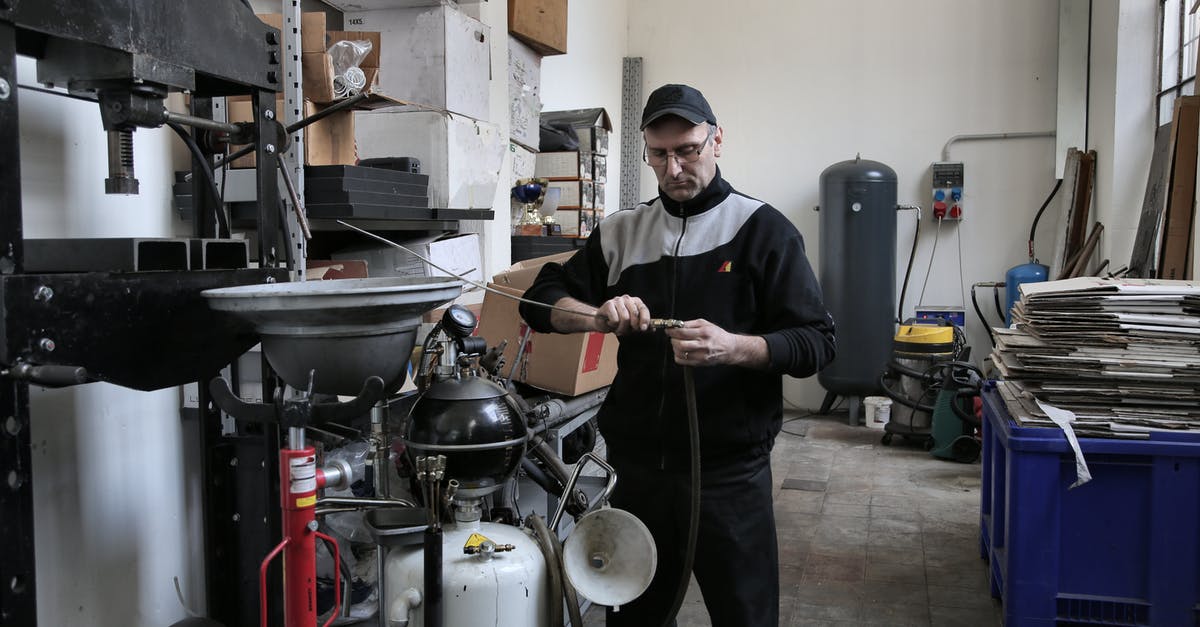What damage does Legacy of Nightmares work with? - Focused mechanic repairing compressor hose in workshop What damage does Legacy of Nightmares work with? - Focused mechanic repairing compressor hose in workshop