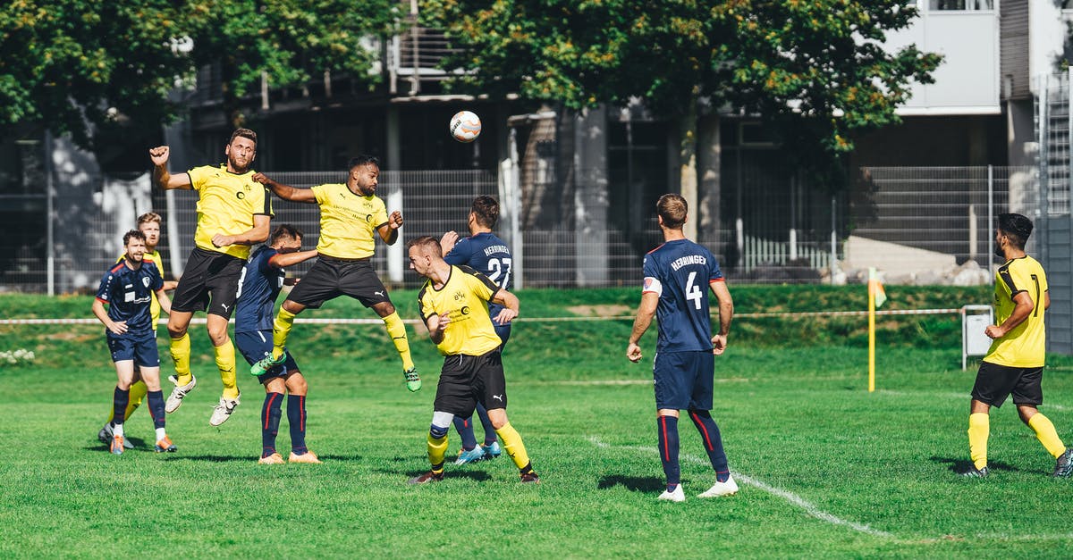 What determines a shelter's score? - Young sportsmen playing football on outdoor field What determines a shelter's score? - Young sportsmen playing football on outdoor field