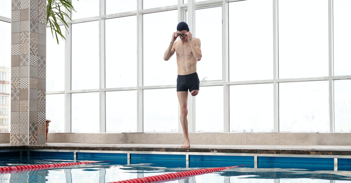 What determines if I get into a skirmish? - Photo Of Man Standing Beside Pool