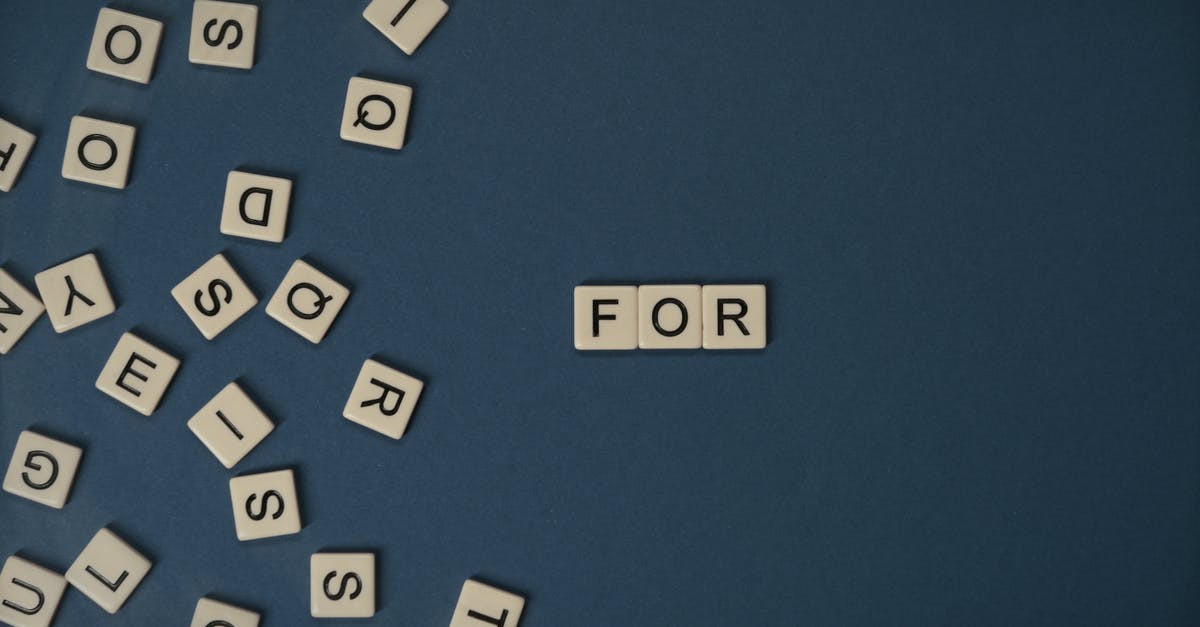 What determines the difficulty for capturing a tile? - Scrabble Tiles on Flat Surface What determines the difficulty for capturing a tile? - Scrabble Tiles on Flat Surface