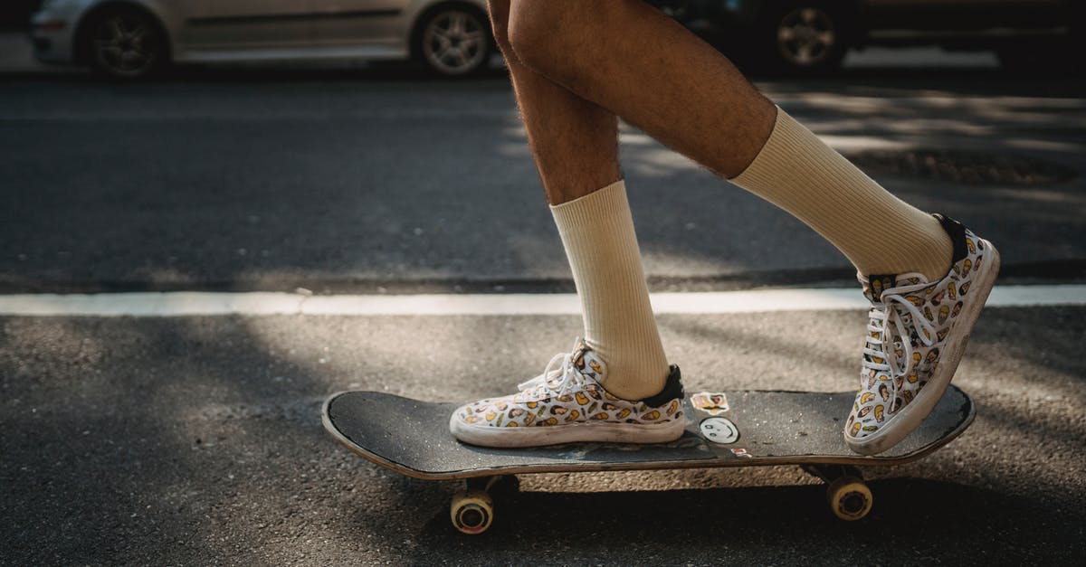 What determines the speed of a Soul Challenge? - Crop faceless skater riding skateboard on roadside What determines the speed of a Soul Challenge? - Crop faceless skater riding skateboard on roadside