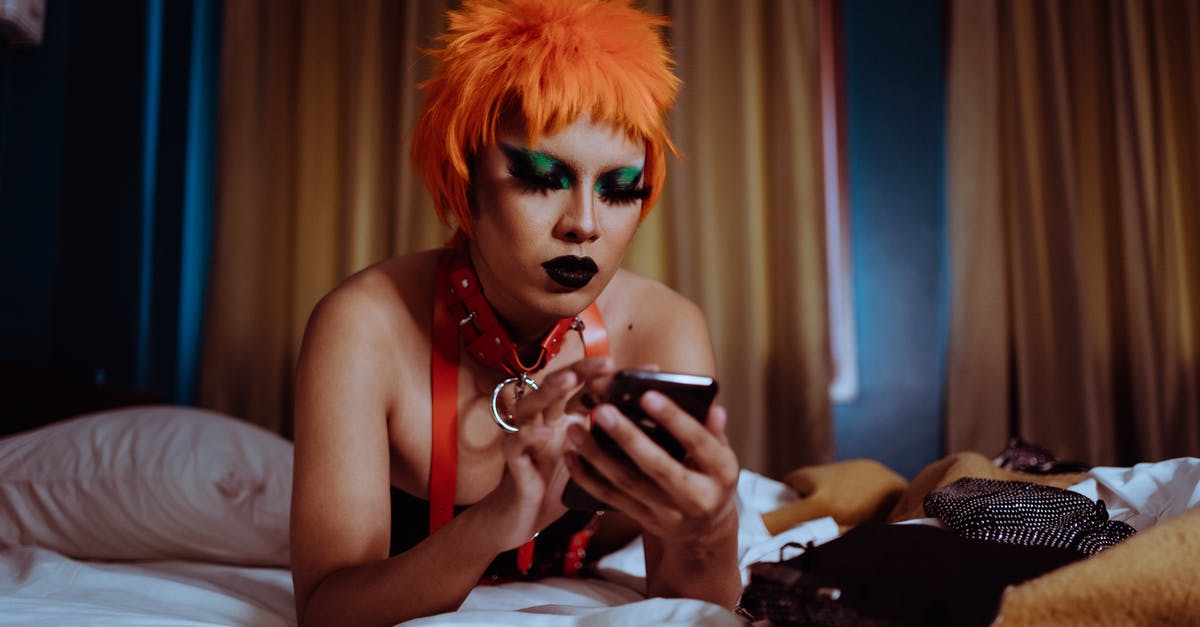 What determines which character gets to use a summon? - Serious young ethnic woman using smartphone lying on bed What determines which character gets to use a summon? - Serious young ethnic woman using smartphone lying on bed