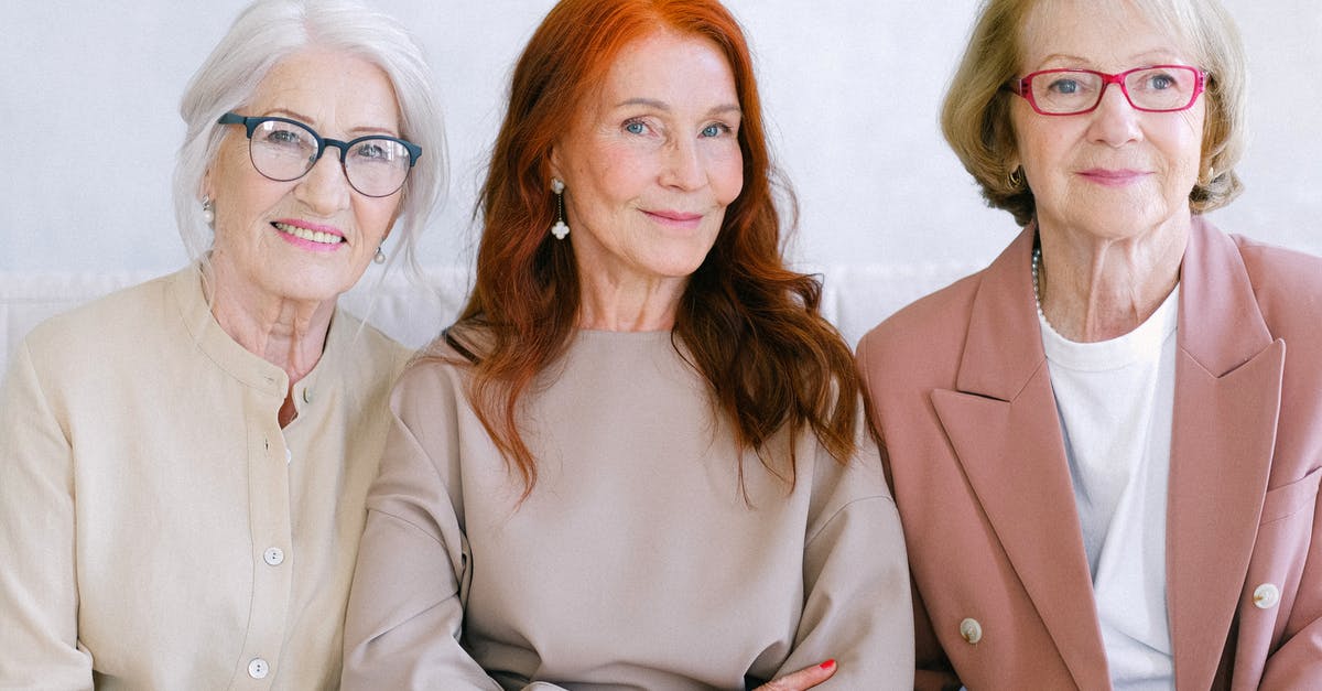 What determines which Mature Content warning Steam gives you? - Aged cheerful women in elegant outfit together What determines which Mature Content warning Steam gives you? - Aged cheerful women in elegant outfit together