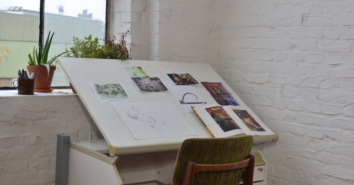 What different types of dye are there? [duplicate] - Interior of art studio with different drawings and sketch on table near chair with potted plant and stationery on window