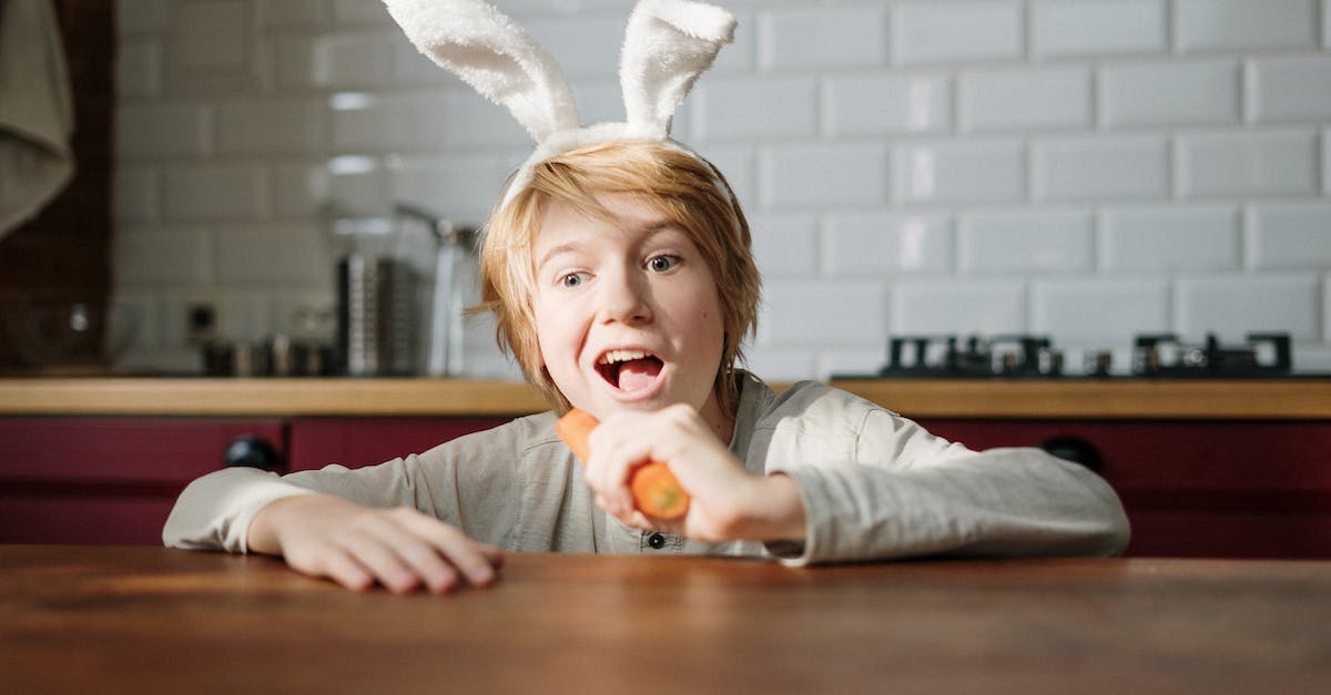 What do bunny carrots do? - Boy with Bunny Ears Eating Carrot What do bunny carrots do? - Boy with Bunny Ears Eating Carrot