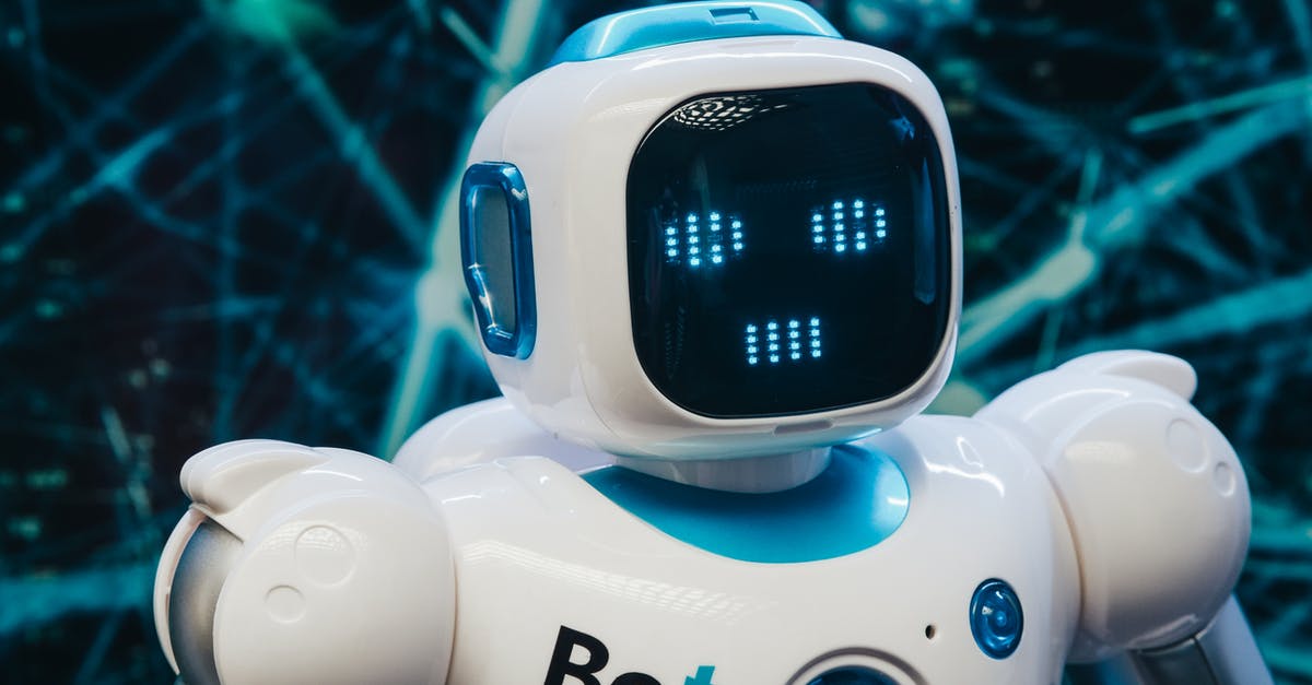 What do each of the AI bots do? - Close Up Photo of Toy Bot