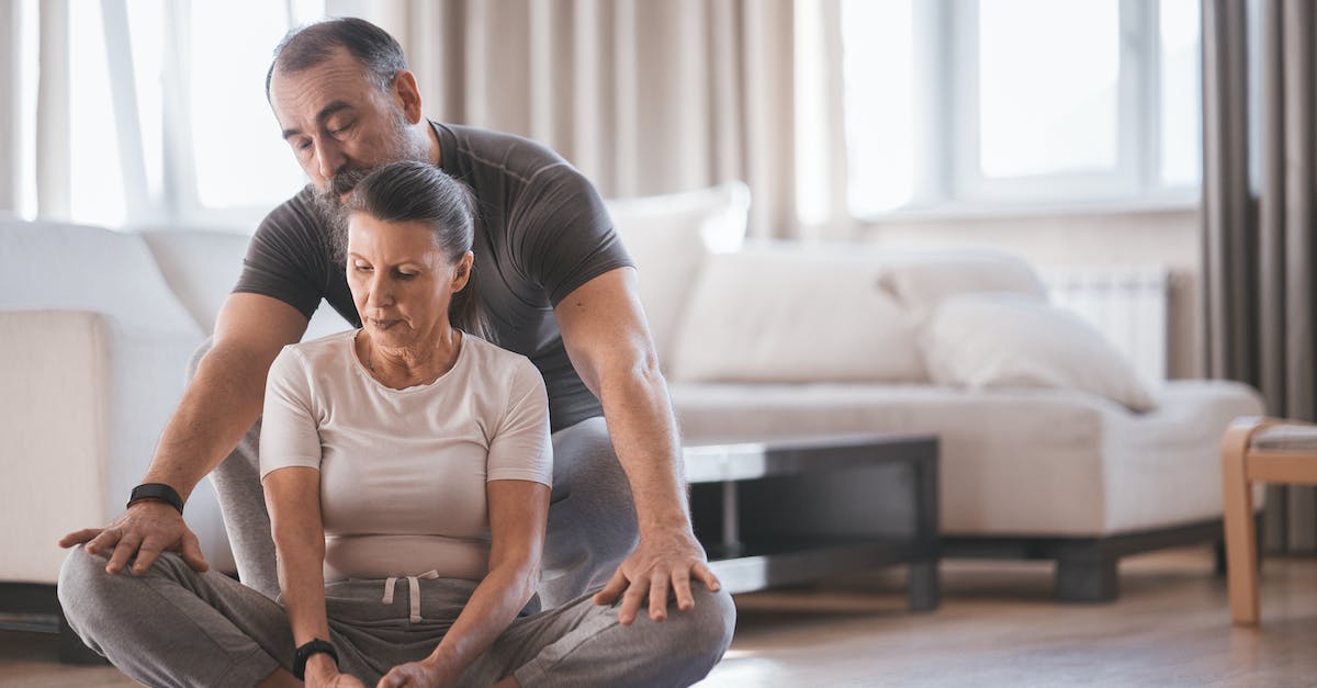 What do FIFA 14 position acronyms mean? - A Man Pressing the Legs of a Woman Doing Yoga Bound Angle Pose