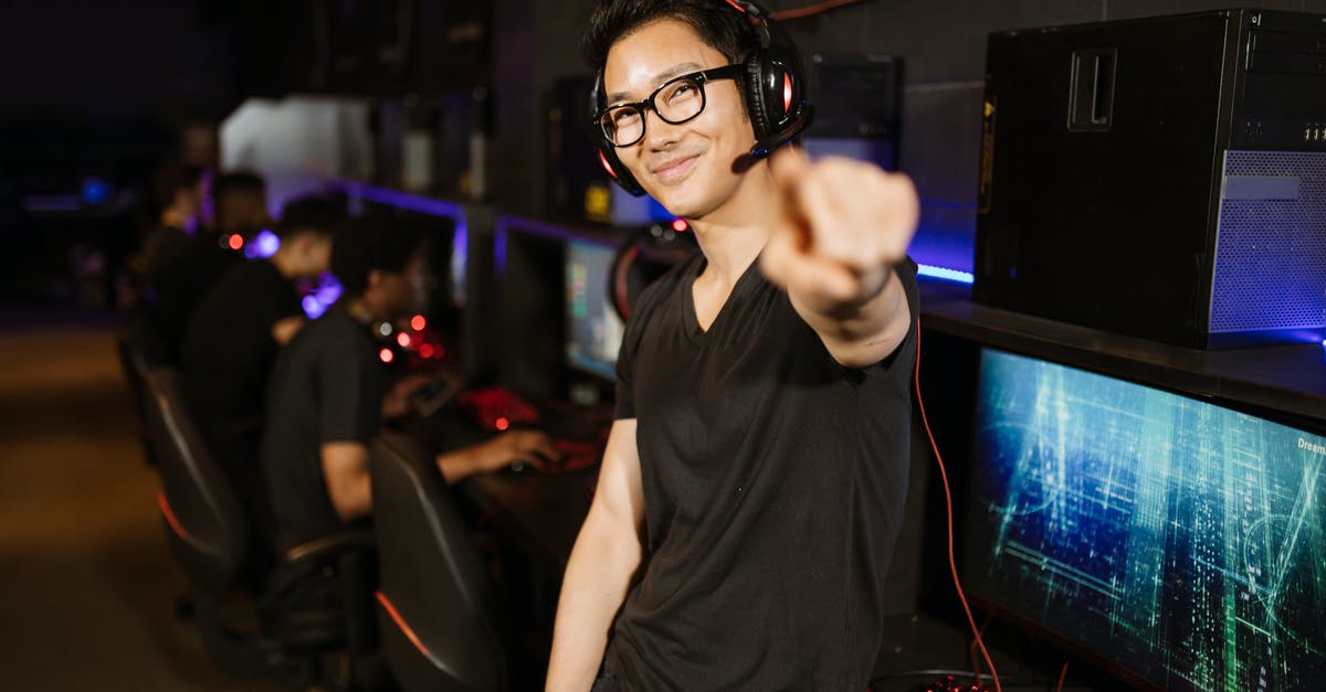 What do gamer points do? [duplicate] - Man in Black Shirt Wearing Black Headphones while Smiling