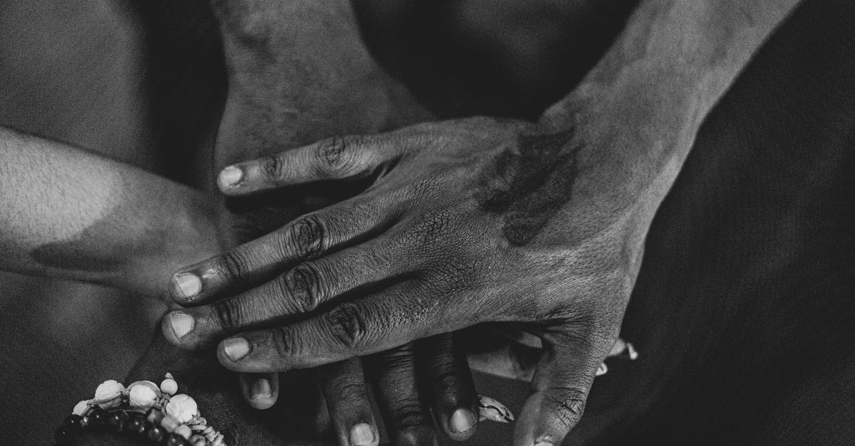 What do I do with stacked units when city is at war? - Grayscale Photo of People's Hands Stacked Together What do I do with stacked units when city is at war? - Grayscale Photo of People's Hands Stacked Together