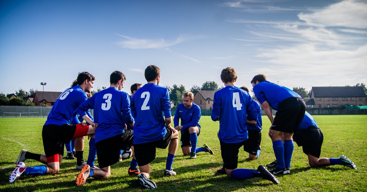 What do Rocket League players mean when they ask to "sign"? - Group of Sports Player Kneeling on Field