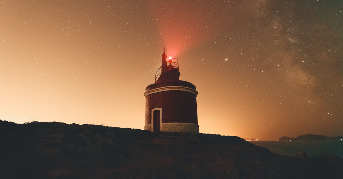 What do targeting beacons do on Star Wars Squadrons? - Red lighthouse on hill at night time