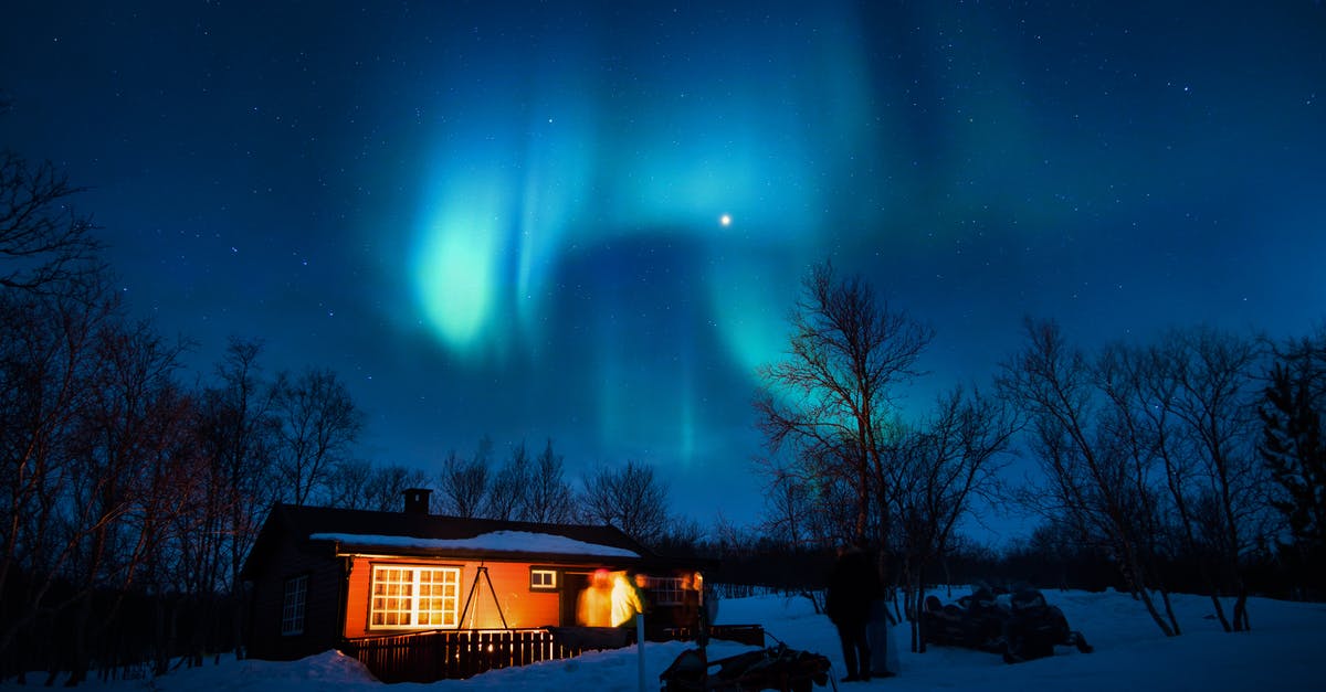 What do the blue stars on areas mean? - Brown Cottage Under Aurora Borealis