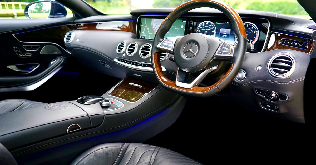 What do the colored steering wheel icons signify in multiplayer? - Gray Car Seat Cover