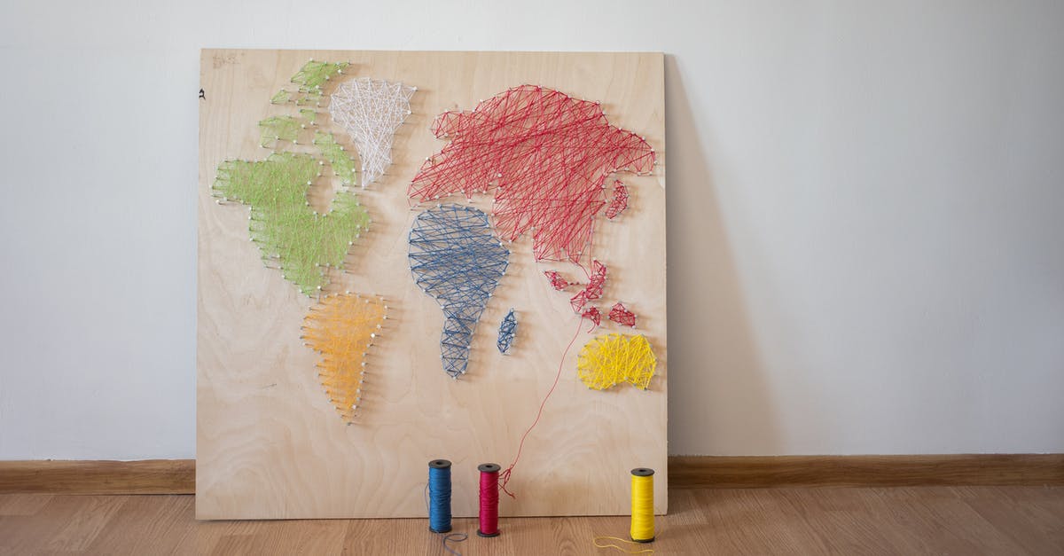 What do the different colors on the map in Pokemon Go represent? - Multicolored string artwork of world map and spools of thread