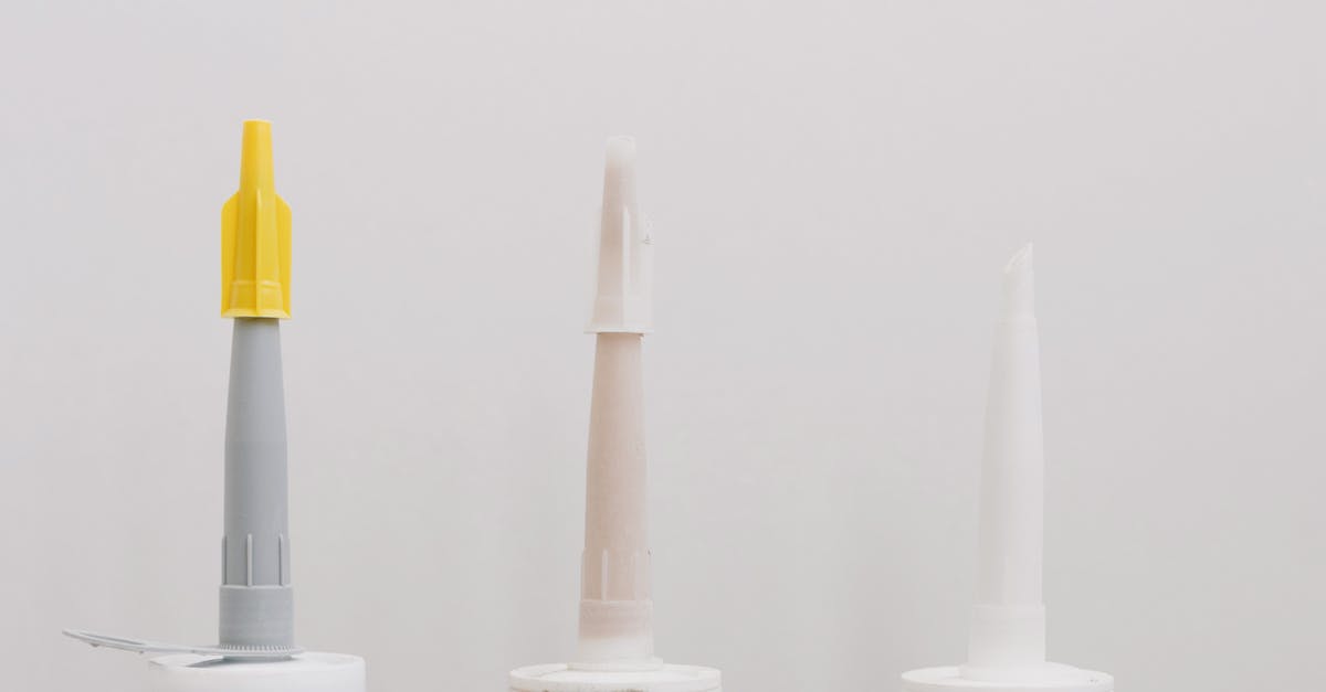 What do the different control styles mean? - Set of various plastic tubes with glue for renovation works in workshop against white background What do the different control styles mean? - Set of various plastic tubes with glue for renovation works in workshop against white background
