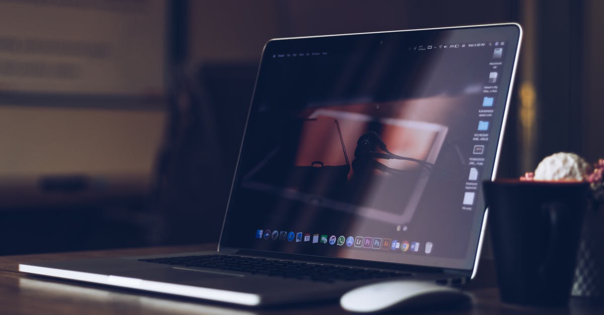 What do the icons on the glyphs mean? - Silver and Black Laptop Computer