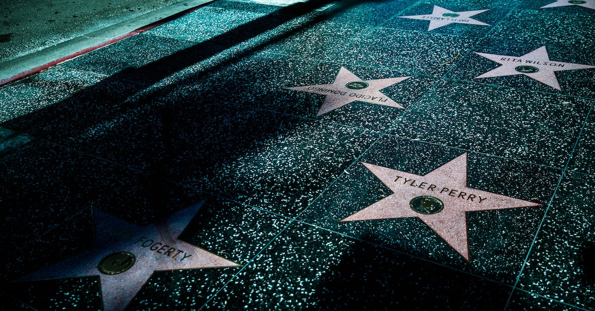 What do the names mean [duplicate] -  Stars on Gray and Black Tiled Sidewalk