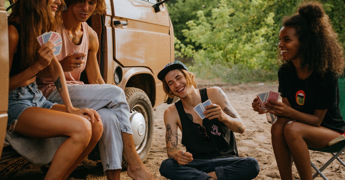 What do the playing cards do in the binding of isaac? - Friends Playing a Card Game outside Their Camper Van What do the playing cards do in the binding of isaac? - Friends Playing a Card Game outside Their Camper Van