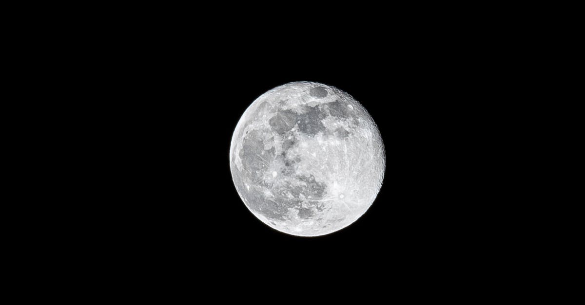 What do the quarter circle and full circle icons mean? - Full moon on black background at night