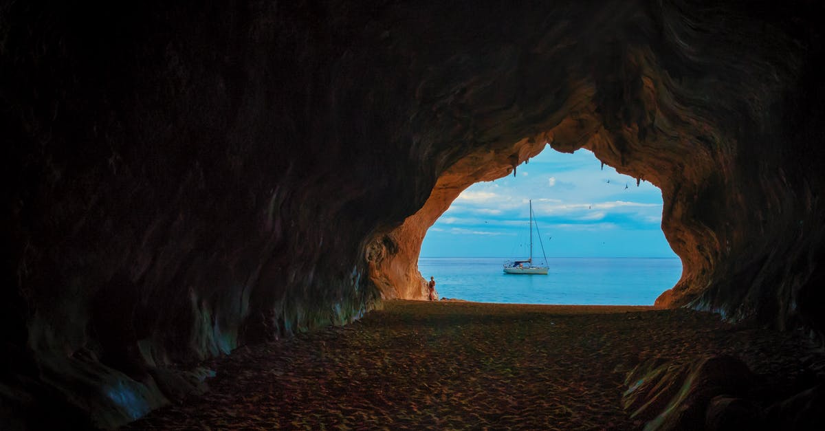 what do the rocks in the cave mean in candy box 2 - Cave Near Body of Water With Boat