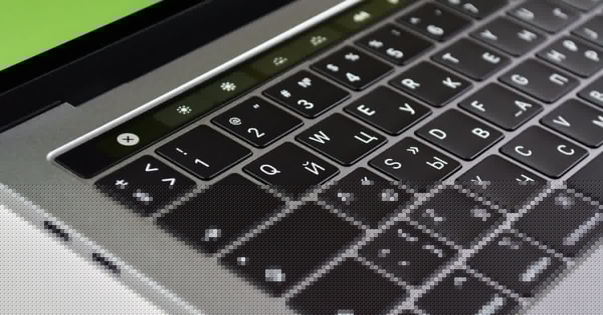 What do the symbols on the top left of the character select screen mean? - Close-Up Photo of MacBook Keyboard What do the symbols on the top left of the character select screen mean? - Close-Up Photo of MacBook Keyboard