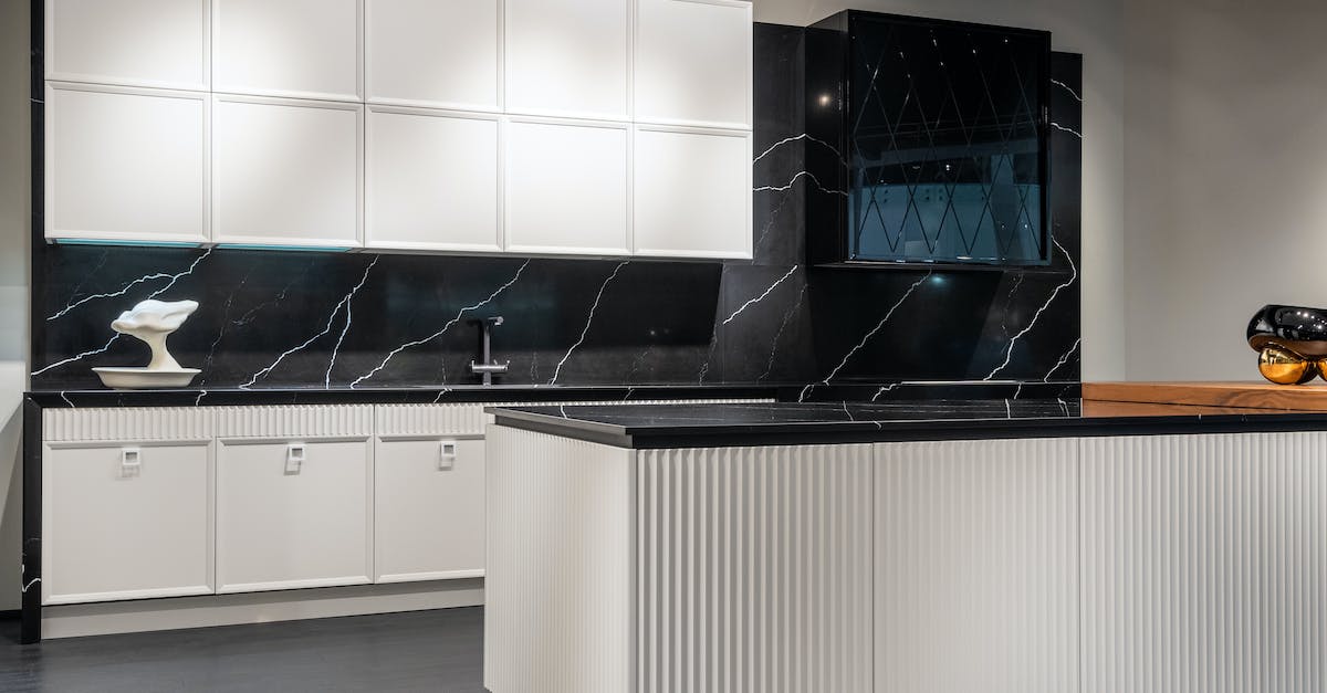 What do the symbols when you recruit a new unit represent? - Contemporary kitchen interior design with empty white and black furniture in modern stylish apartment