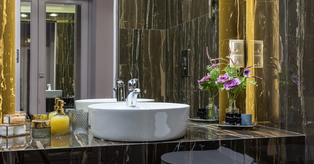 What do the various locked door colors mean? - Contemporary bathroom with washstand between decorative flowers and liquid soap reflecting in mirror against door What do the various locked door colors mean? - Contemporary bathroom with washstand between decorative flowers and liquid soap reflecting in mirror against door