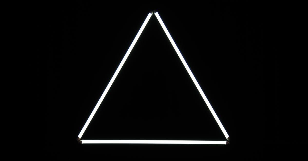 What does a white/yellow rank icon mean - White triangle on black background