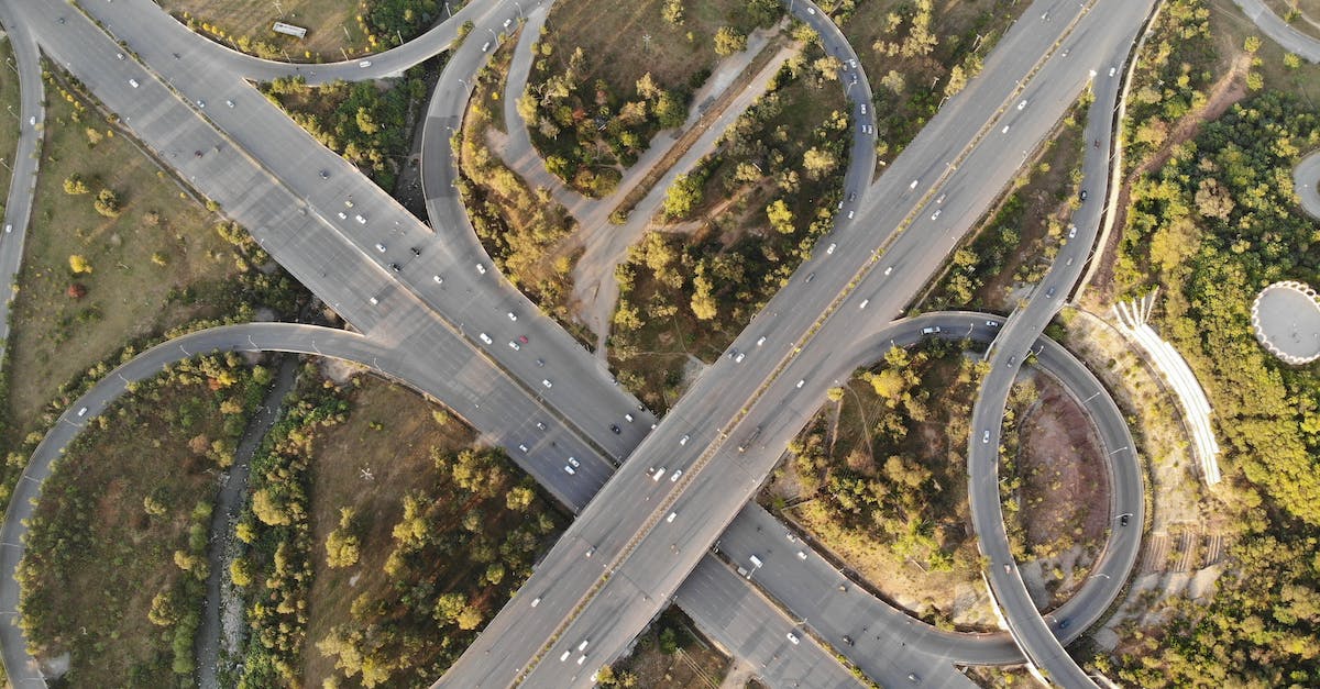What does an interchange do? - Aerial Photography of Concrete Road