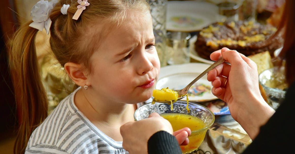 What does eating soup do to me? - Person Feeding a Young Girl What does eating soup do to me? - Person Feeding a Young Girl