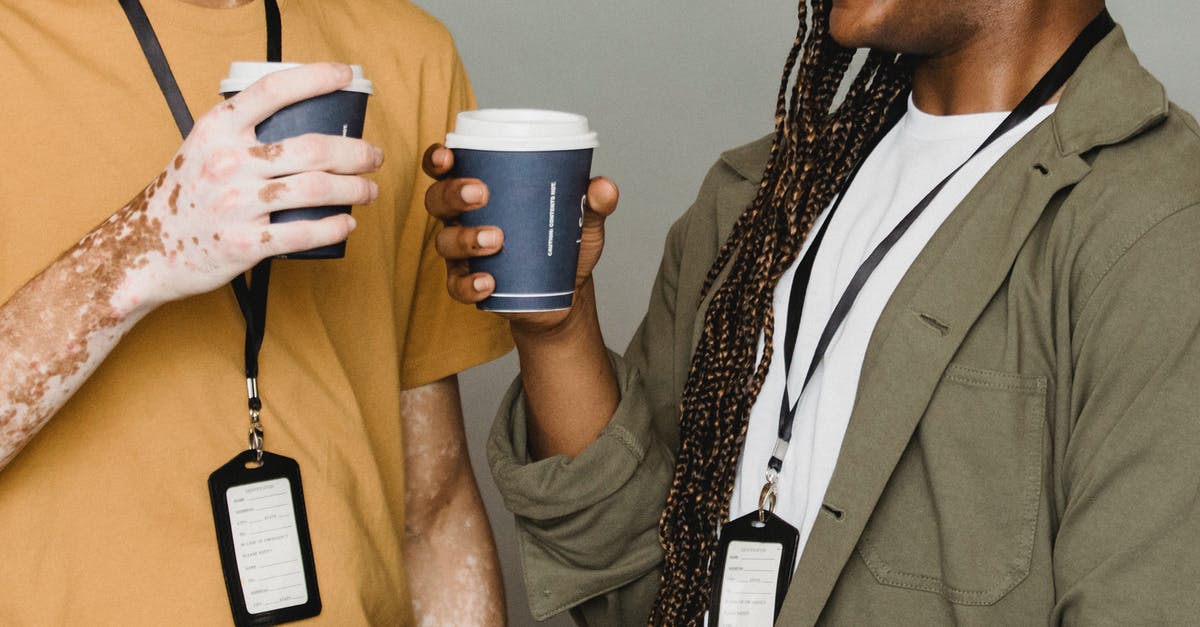 What does F.A.N.G.'s name stand for? - Smiling black man with braids having coffee with friend What does F.A.N.G.'s name stand for? - Smiling black man with braids having coffee with friend