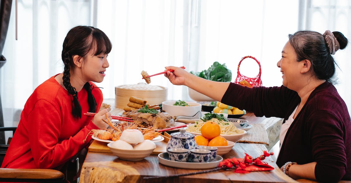 What does feeding the elders do in KittensGame? - A Grandmother Feeding Her Granddaughter What does feeding the elders do in KittensGame? - A Grandmother Feeding Her Granddaughter