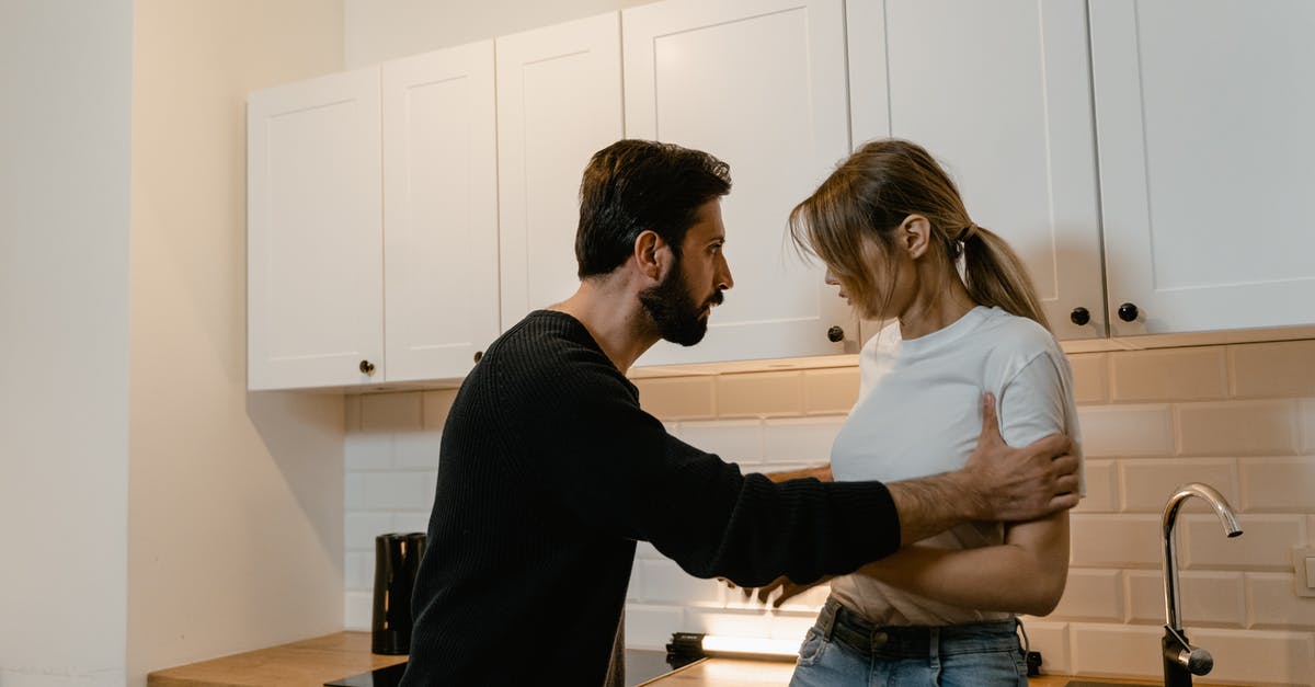 What does negative skill progress mean? - Man and Woman Standing in Front of Kitchen Cabinet