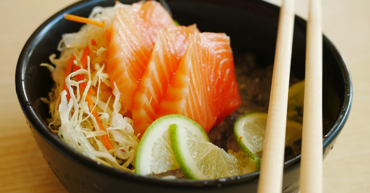 What does orange (normal eggs) do in Salmon Run? - Slices of Salmon Sashimi with Slices of Lime on Black Bowl What does orange (normal eggs) do in Salmon Run? - Slices of Salmon Sashimi with Slices of Lime on Black Bowl