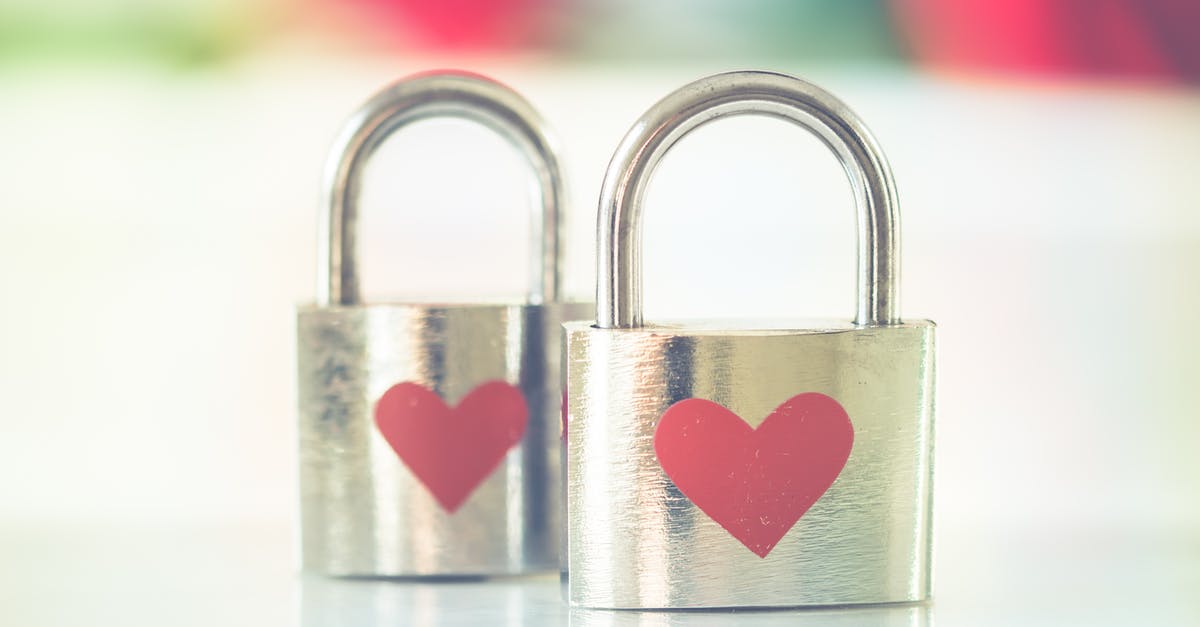 What does pausing the AI do in Hearts of Iron 4? - Bokeh Photo of Two Heart-printed Stainless Steel Padlocks