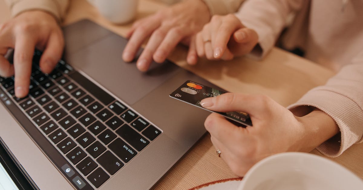 What Does PSN Mean When Purchasing A Game? - Close-Up Shot of Two People Shopping Online