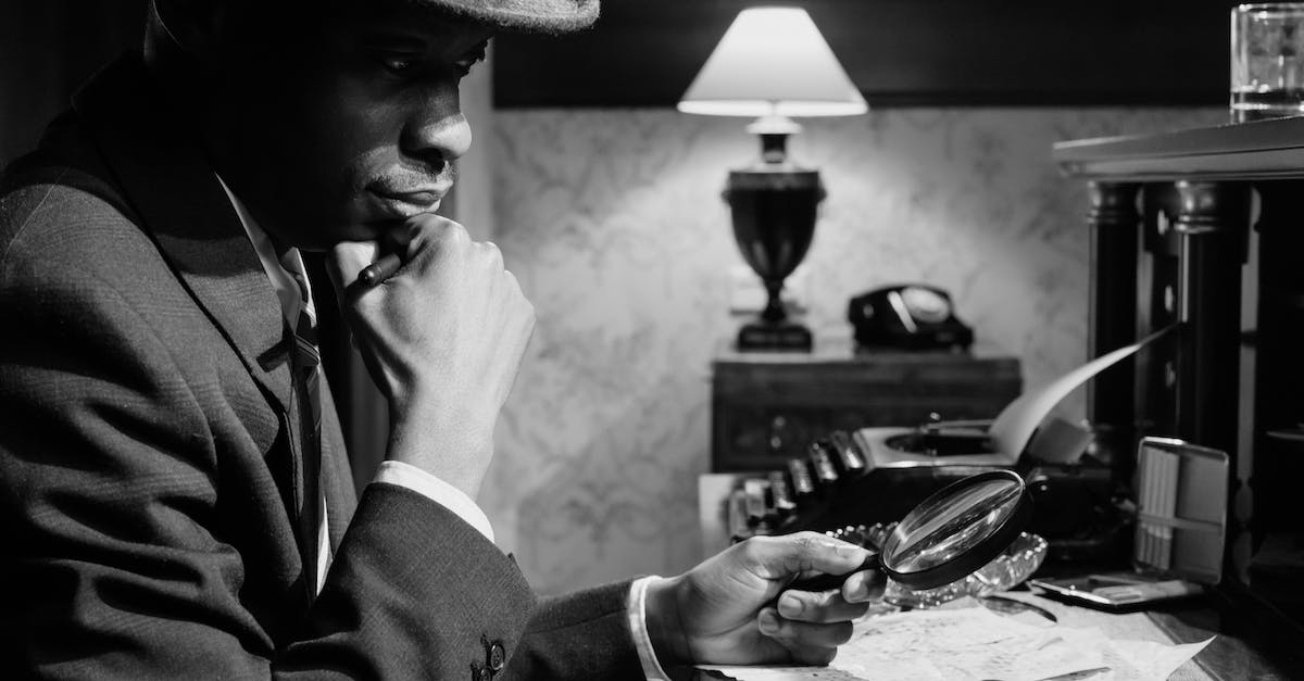What does ranking up Investigator improve? -  Monochrome Photo of Man Doing an Inspection